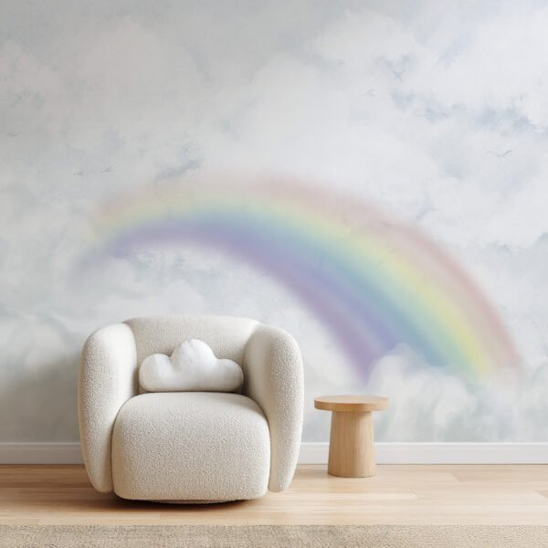 Mural ilustrado de arcoíris pastel entre nubes en habitación infantil - Alchemyst