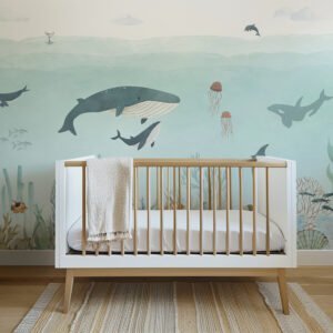 Mural ilustrado de océano con ballena en tonos suaves en habitación infantil - Alchemyst