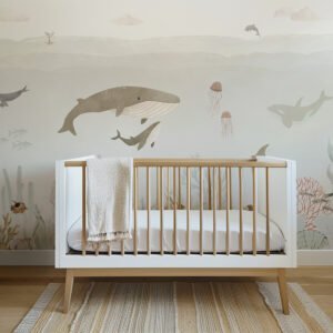 Mural ilustrado de océano con ballena en tonos suaves en habitación infantil - Alchemyst
