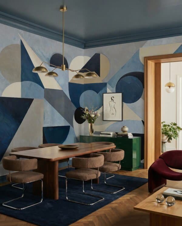 Mural ilustrado abstracto geométrico con triángulos y círculos en tonos azules y beige - Alchemyst
